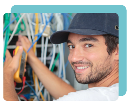 Electrician graduate at work